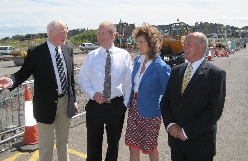 Ming discusses the importance of regeneration money with local MSP Iain Smith and St Andrews councillors.